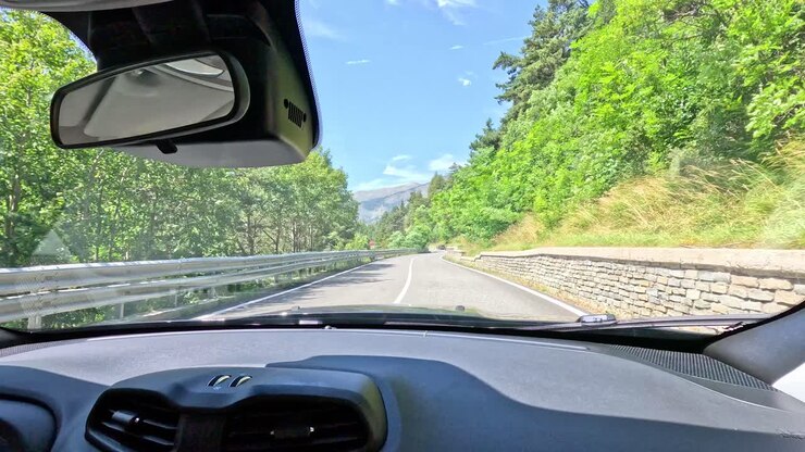 Driving through mountainous terrain in Piedmont, Italy