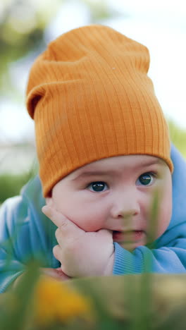 baby in an orange hat