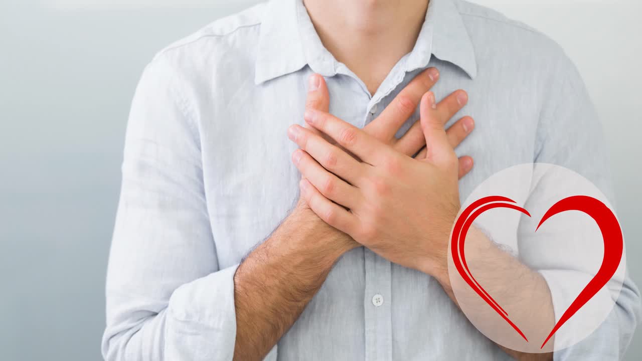animación del icono del corazón sobre el hombre caucásico tocando su pecho