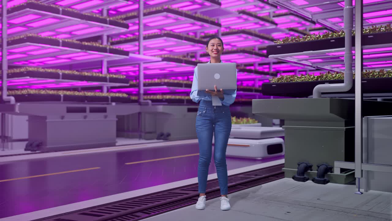 Woman working in a vertical farm