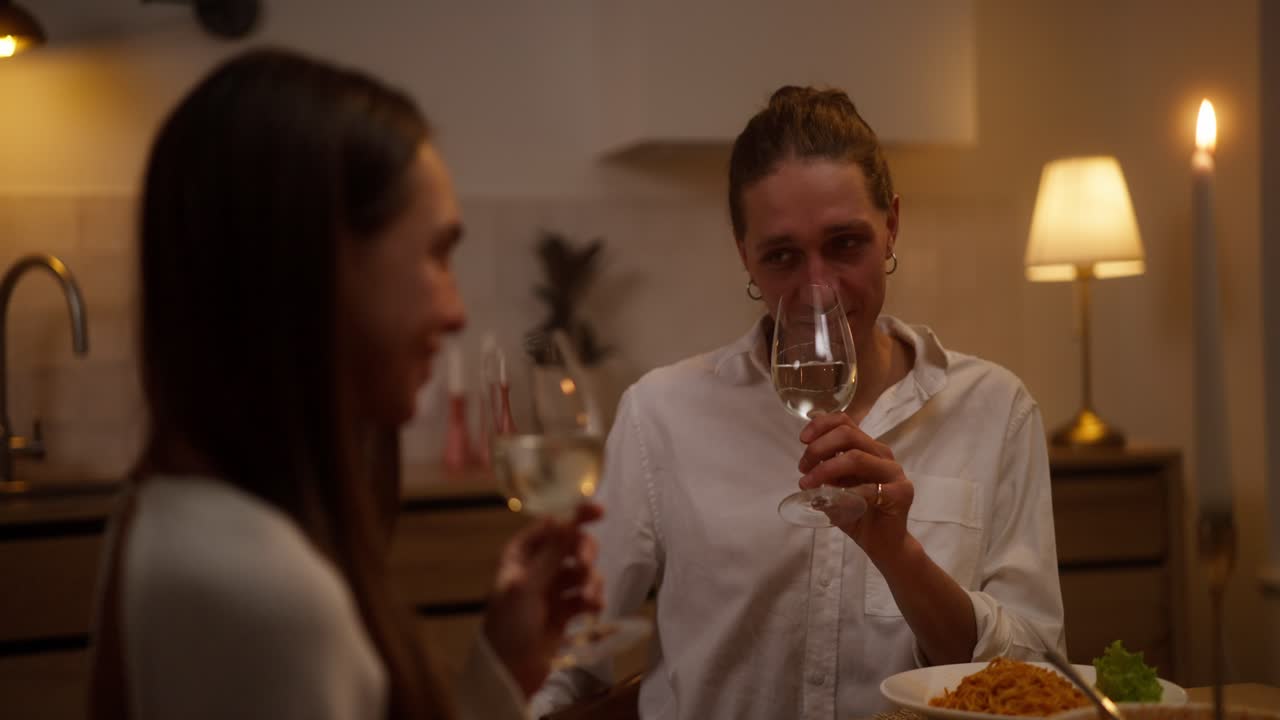 Couple enjoying dinner at home