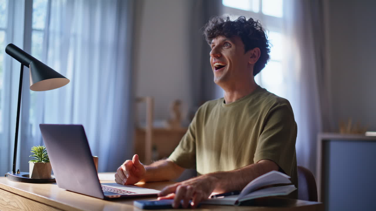 Focused businessman receiving notification at laptop table workplace closeup