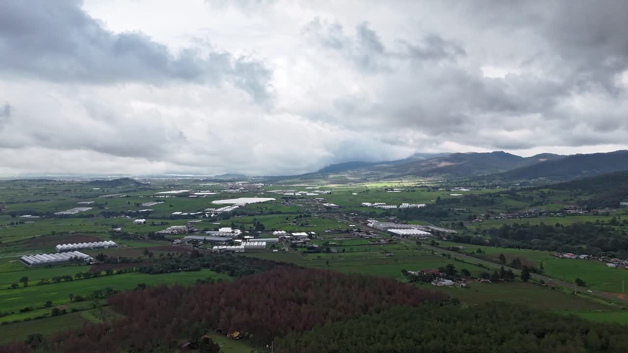 Mexico Weather Hyperlapse: Clouds Racing Over Greenhouses and Fields