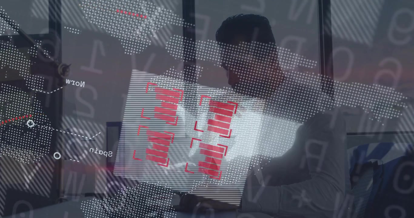 man typing on laptop in modern data analytics office, displaying digital world map with bar charts