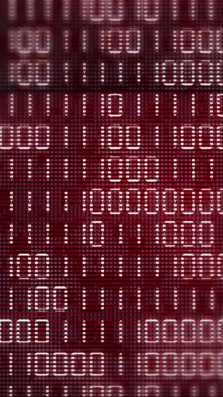 Red electronic screen with changing binary code. Computer display with flickering dots and pixels. Abstract animation with blurred background. Vertical video.