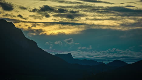 quick panorama of the mountain silhouette in front of a beautiful and colorful sunset