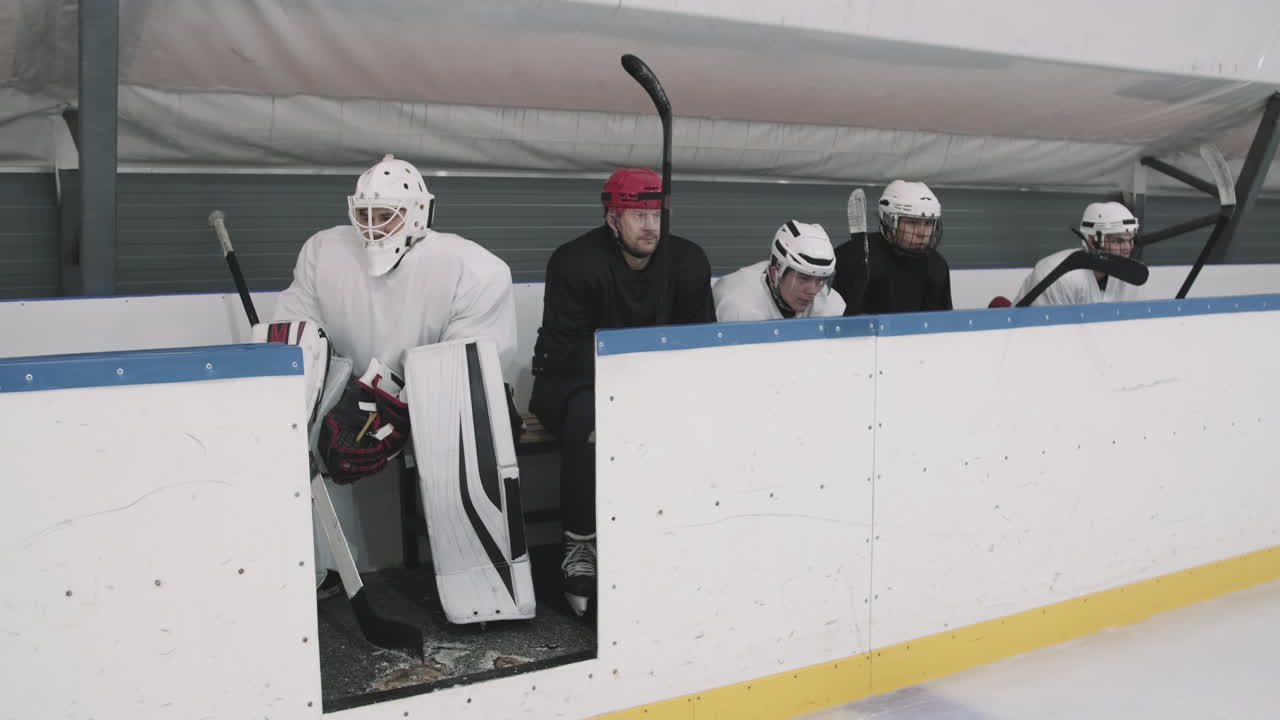 Active Hockey Players Going Out On Ice Arena