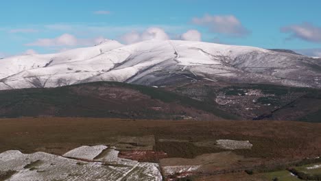 mountain slopes in remote landscape near cancillas in cervantes, lugo, spain. aerial drone shot