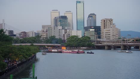 osaka city as tenjin matsuri boat pyres travel down okawa river