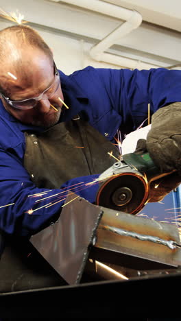 welder working at work shop