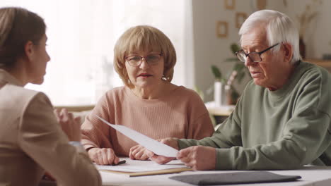 senior couple having consultation with insurance agent