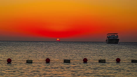 stunning time lapse above the ocean and a boat in the water