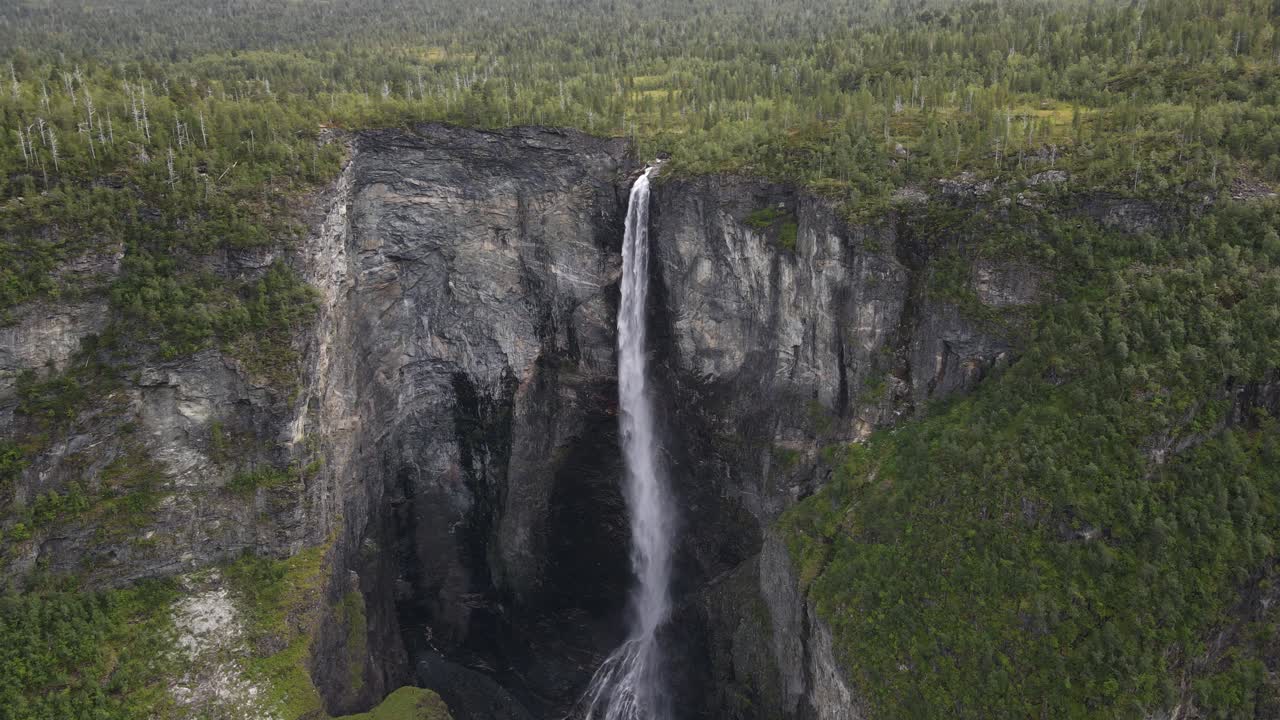 Flying towards Vettisfossen waterfall in Norway. Drone footage