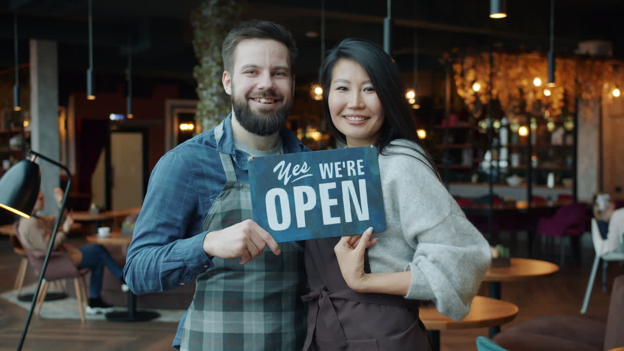Friendly Staff Welcoming Customers at Cafe