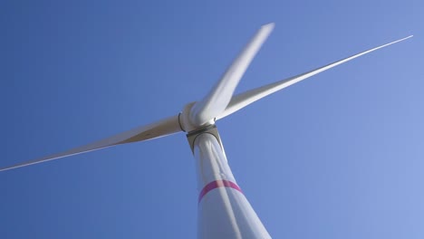 SLOWMO---Detail-of-windmill-turbine---rotation---from-bottom