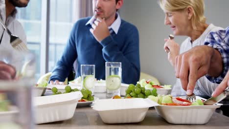 businesspeople having breakfast