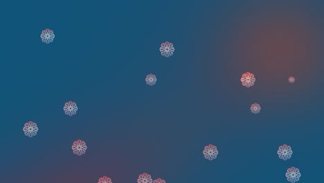 Digital-animation-of-snowflakes-icons-falling-against-copy-space-on-blue-gradient-background