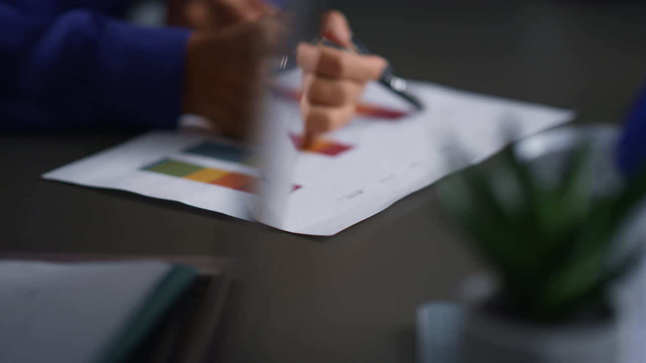 Business people consultant hands writing on a document