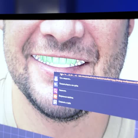 dental technician designing dental crowns. workplace and tools of dental technician in dental laboratory