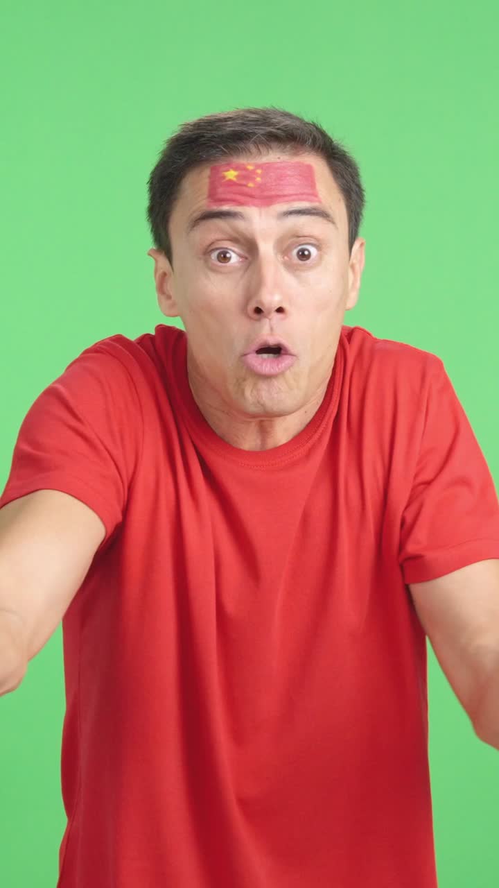 Man Cheering for China, angry with the decision of referee