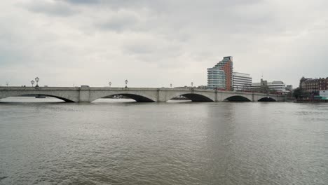 Small-urban-bridge-with-slow-traffic-wide-shot