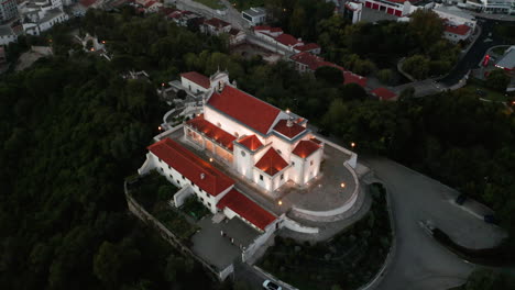 Top-Roof-Exterior-Of-Santuario-Nossa-Senhora-da-Encarnacao-During-Sundown-In-Leiria,-Portugal