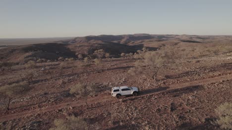 exploring the rugged hills in the outback australia in a four-wheel-drive