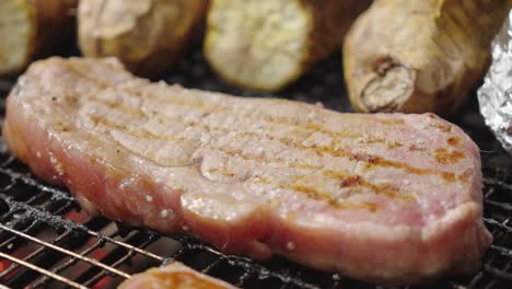 beef sirloins on barbecue, the aroma of smoky char combined with meat