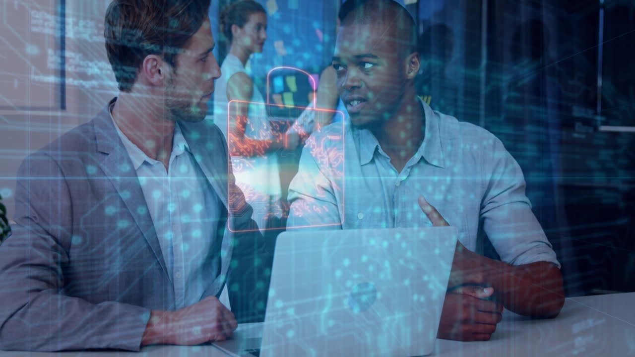 Business professionals discussing over laptop with digital data overlay animation
