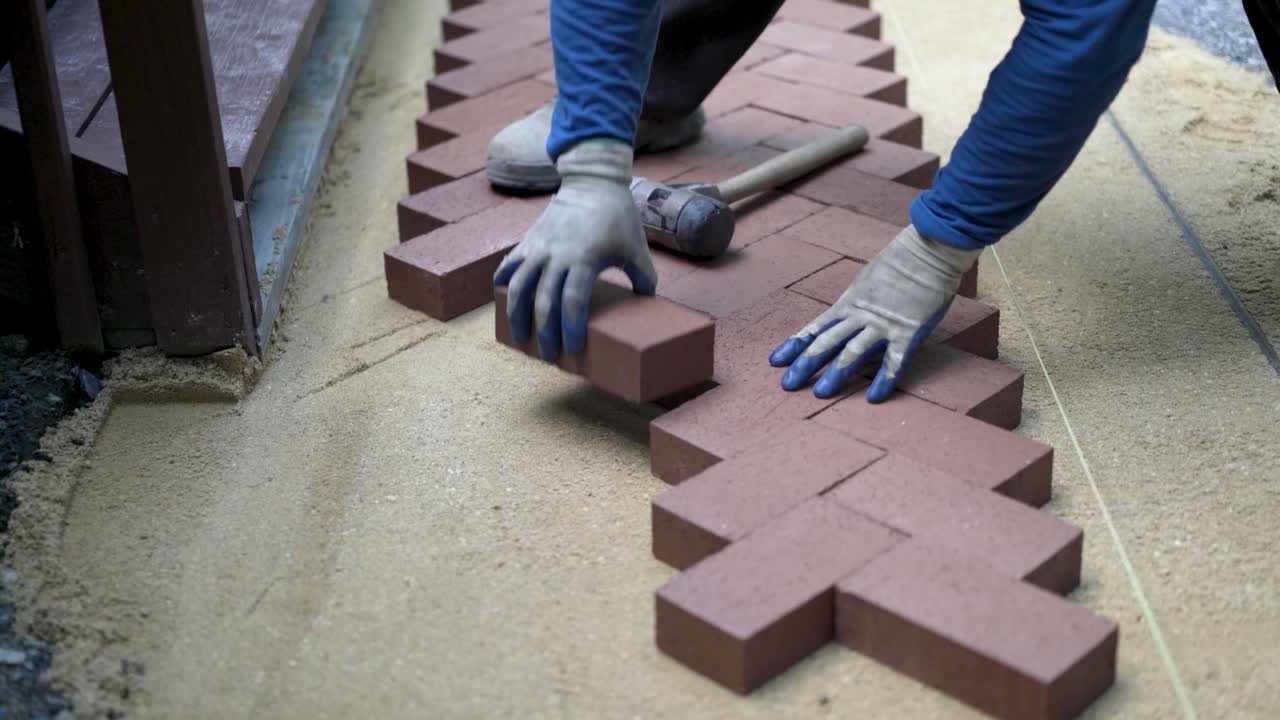 Bricklaying a Herringbone Pattern Pavement