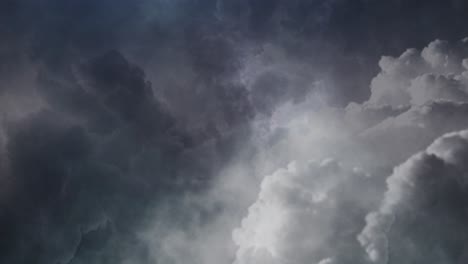 view of moving dark gray clouds swirling in the sky