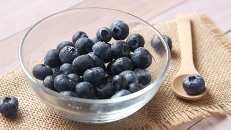 fresh blueberries in a glass bowl