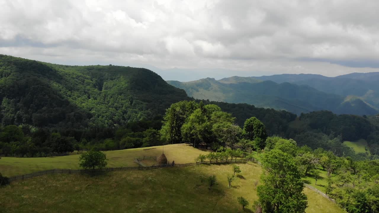 Sun coming over the shadowed lane, stunning view over the mountain range, great synchronization
