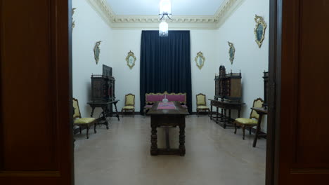 antique furniture in palace room, dolly forward view