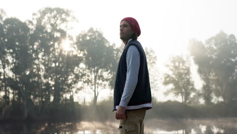 camping, countryside and man with view of lake