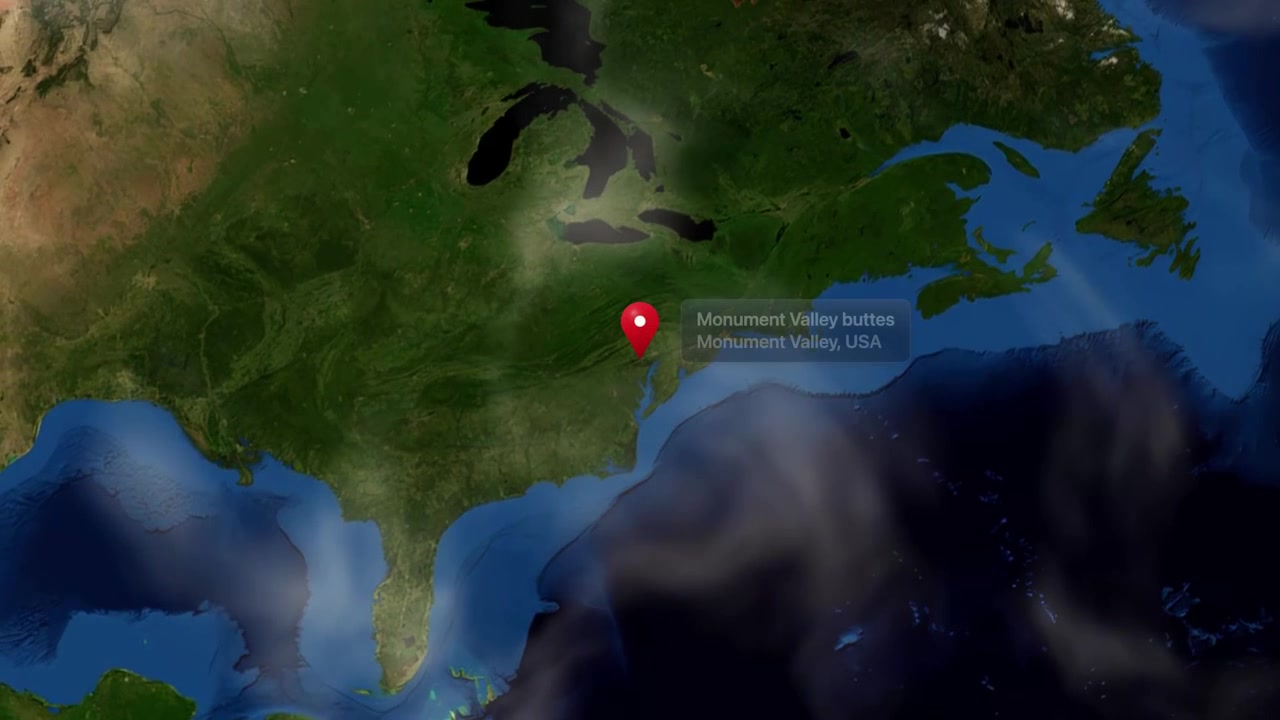 3D realistic animation zooms from rotating planet Earth into North America with a geographic pin. Includes NASA public domain imagery.