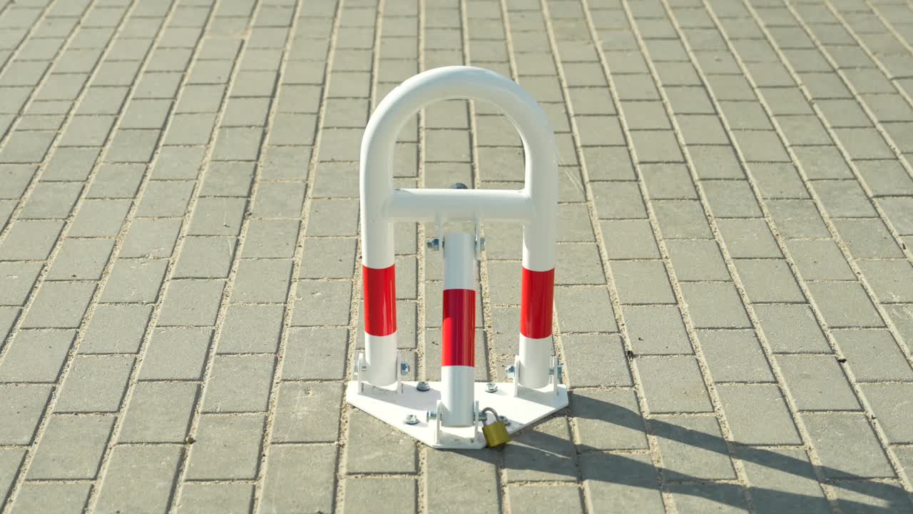 White and Red Parking Barrier with Lock