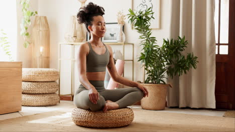 woman meditating at home