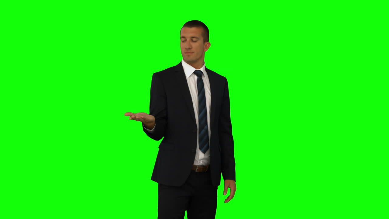 Businessman presenting with hand