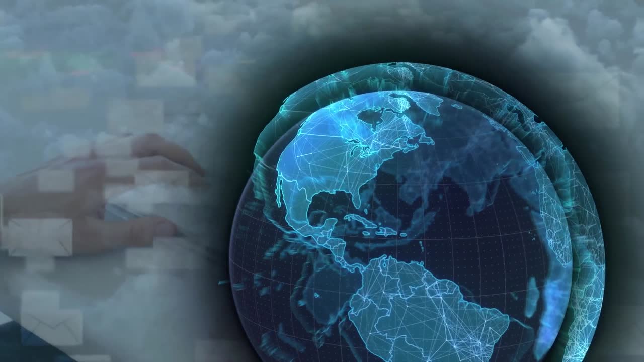 키보드에 타이핑하는 손을 통해 지구와 봉투 아이콘의 애니메이션