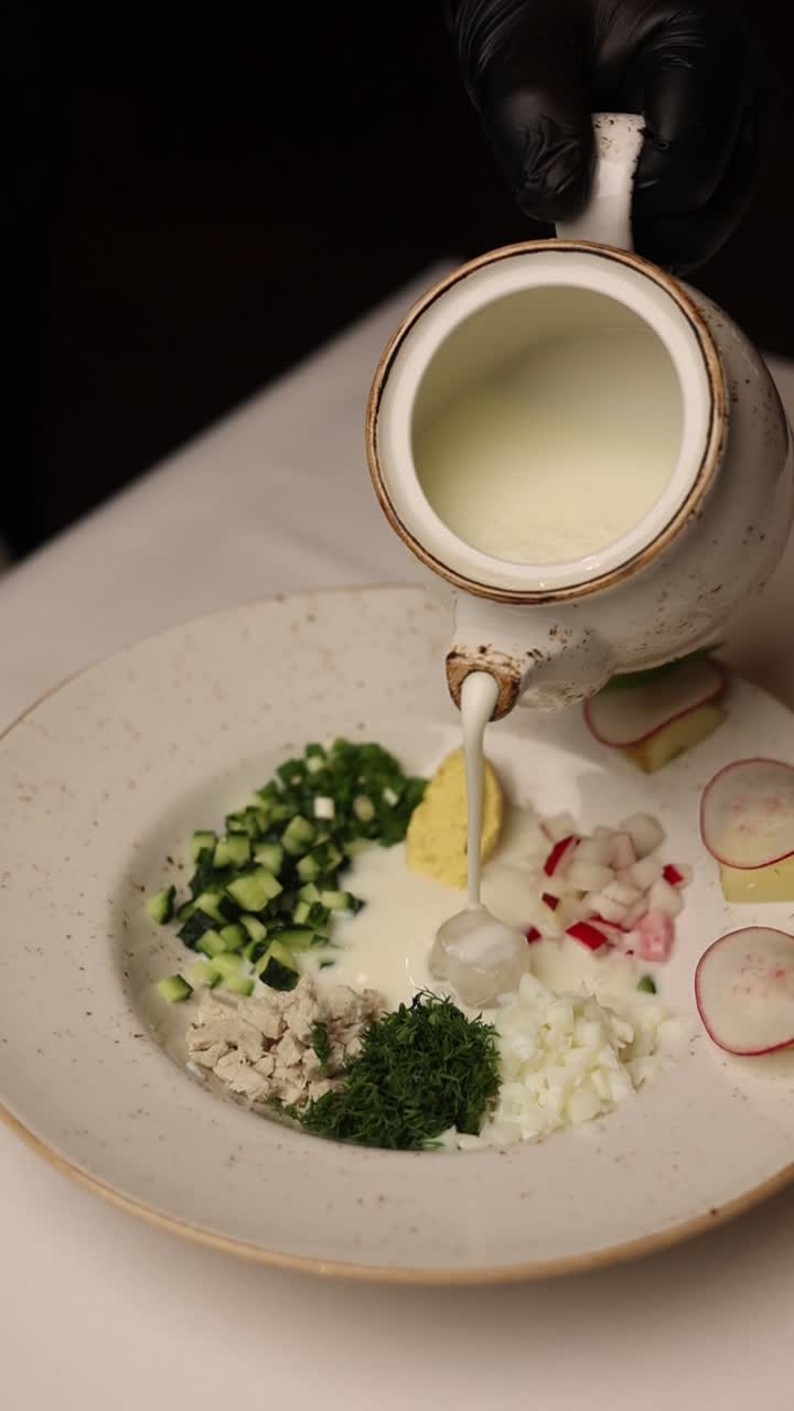 Pouring Cold Russian Soup (Okroshka)