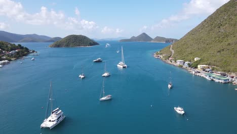 beautiful aerial view of very large sailing yachts near the british virgin islands customs house