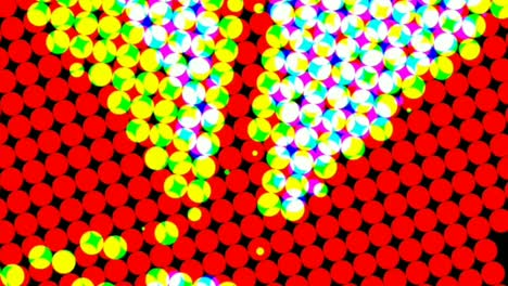 computerized animation of small white and yellow circles revolving on red background