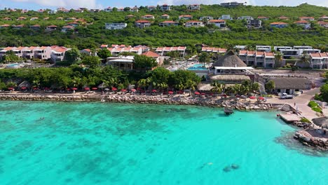 aerial establishing view of karakter tropical caribbean beach in curacao on beautiful sunny day