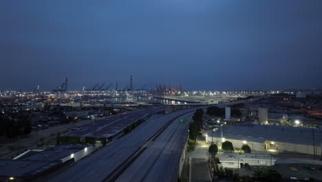 nighttime view of the san pedro port from over interstate 110 - aerial