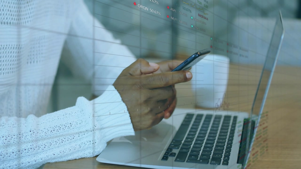 Animation of financial data processing over african american men using smartphone