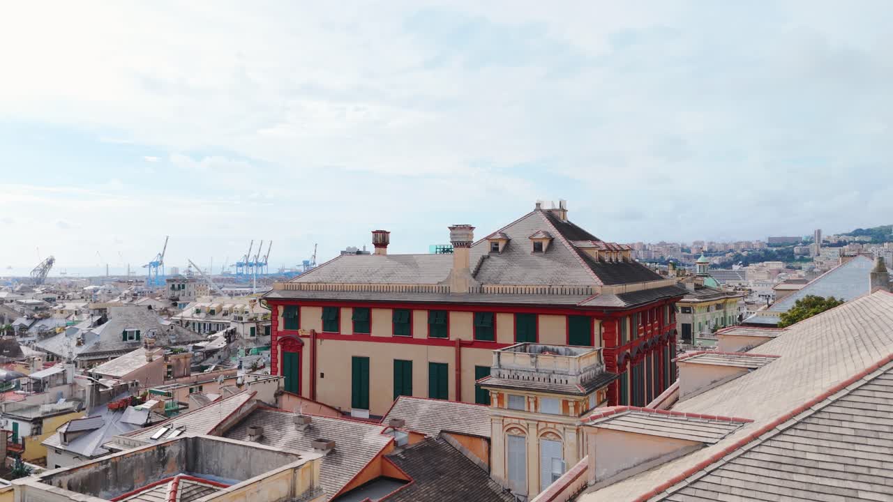 Genoa's historic center with ornate buildings and classic architecture on a cloudy day