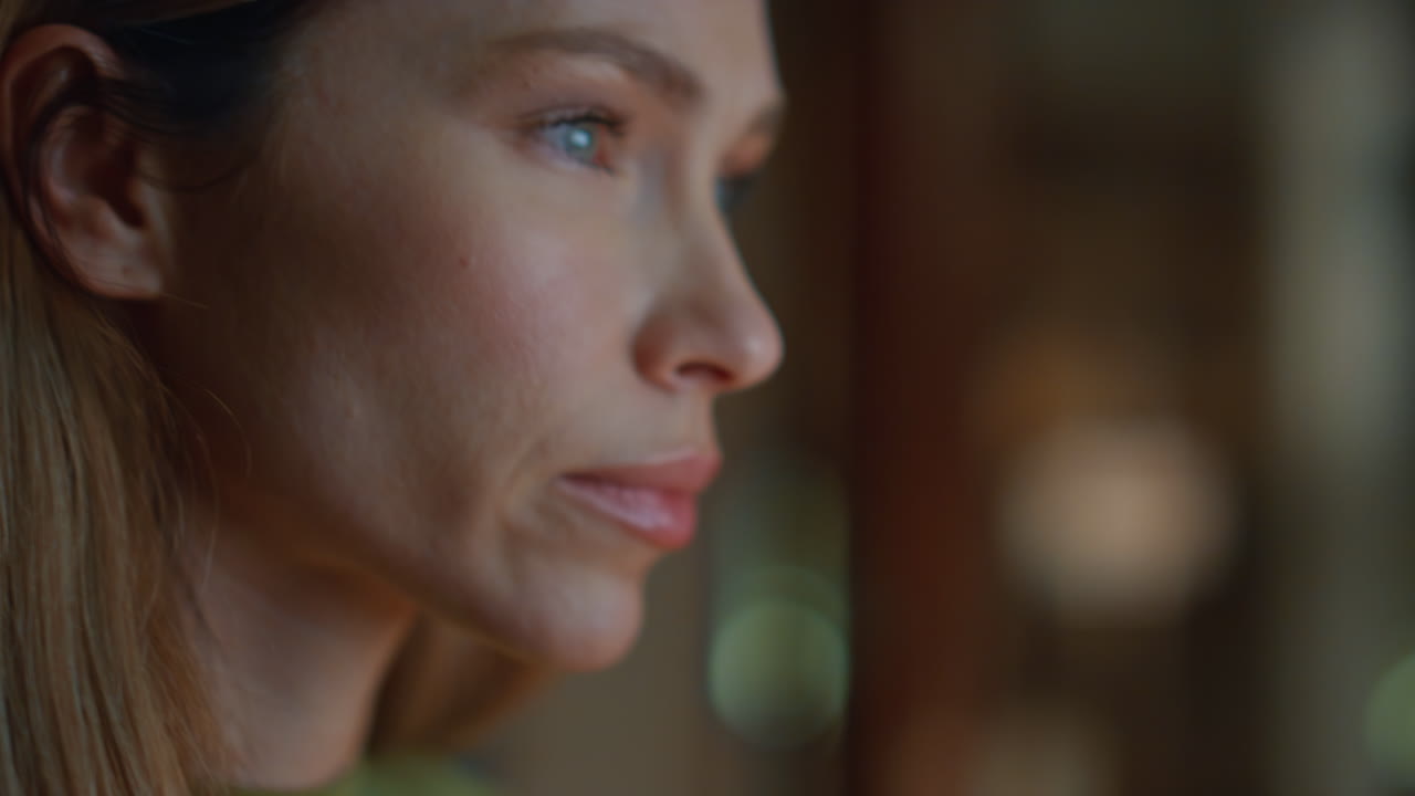 Closeup student studying night looking computer. Portrait focused woman overtime