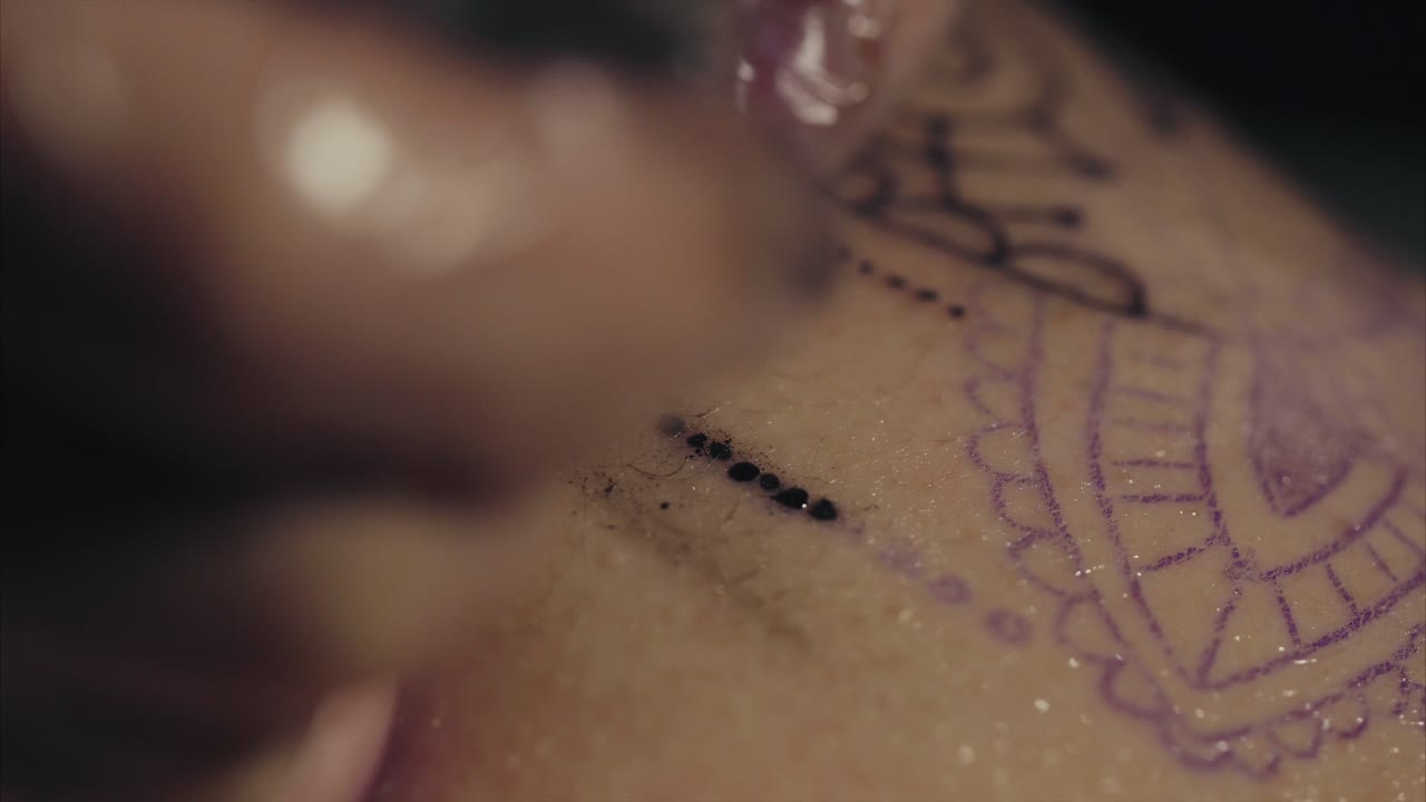 Tattooing in progress