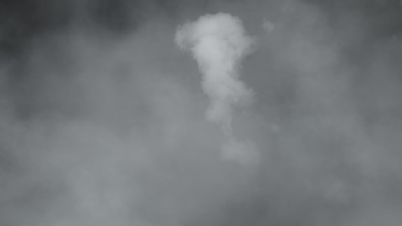 Professional 4K slow-motion VFX background of Halloween smoke and dense fog, an artistic spooky element for horror intros, eerie overlays, and cinematic visual storytelling projects